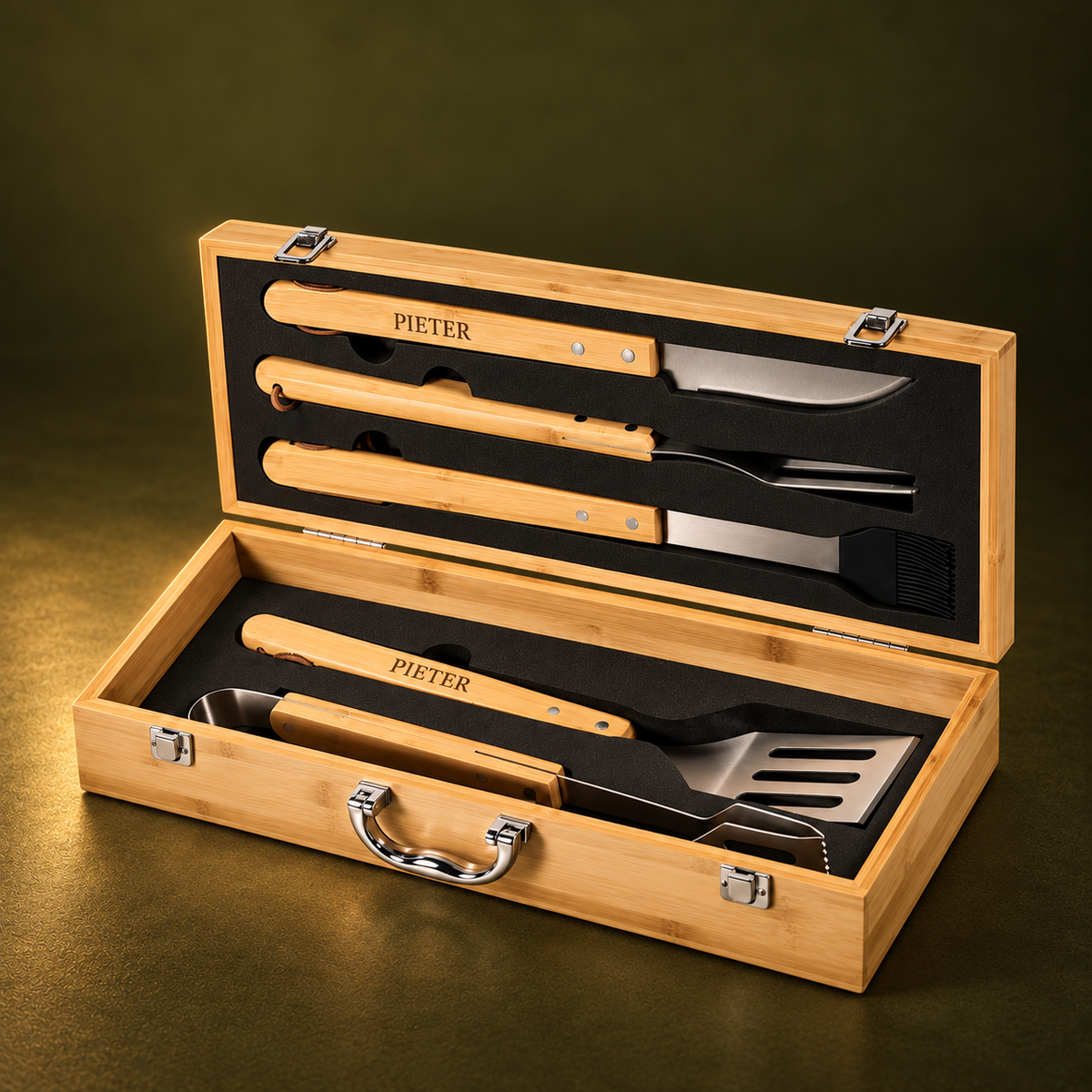 Open bamboo gift box showing five stainless steel braai tools