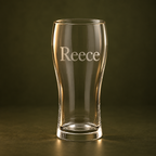 Personalised beer glass engraved with Reece on dark olive background