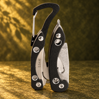 Pocket knife keychain with example blade engraving on olive green background