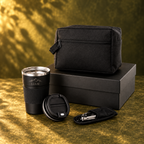 Travel gift set with personalised 380 ml mug, toiletry bag, pocket knife and protective holder on olive green background