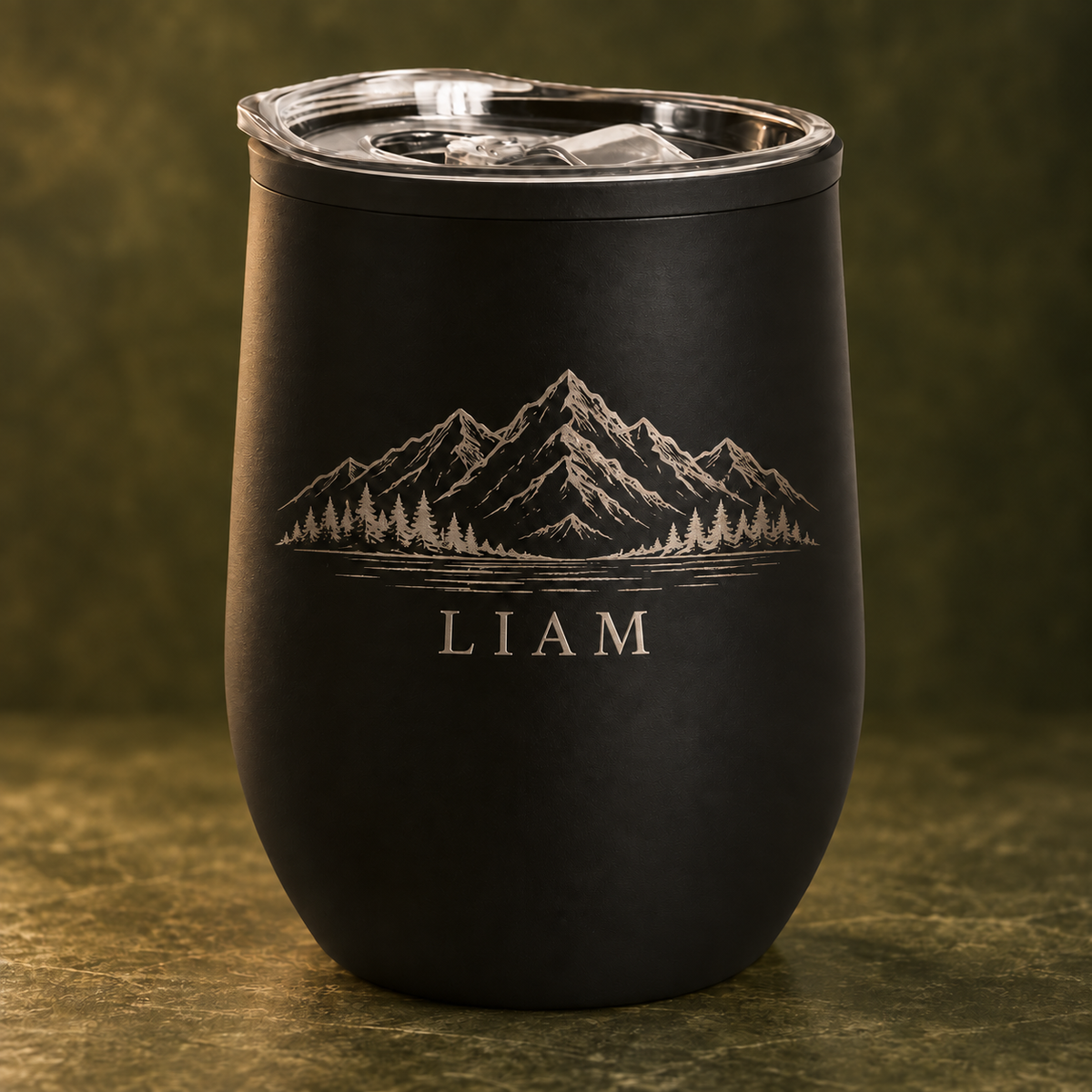 Black 350 ml travel mug with mountain and Liam example engraving